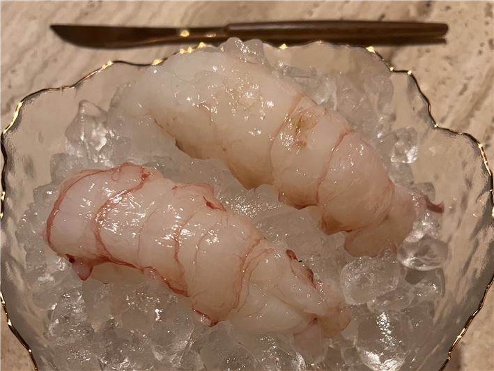 raw langoustines displayed